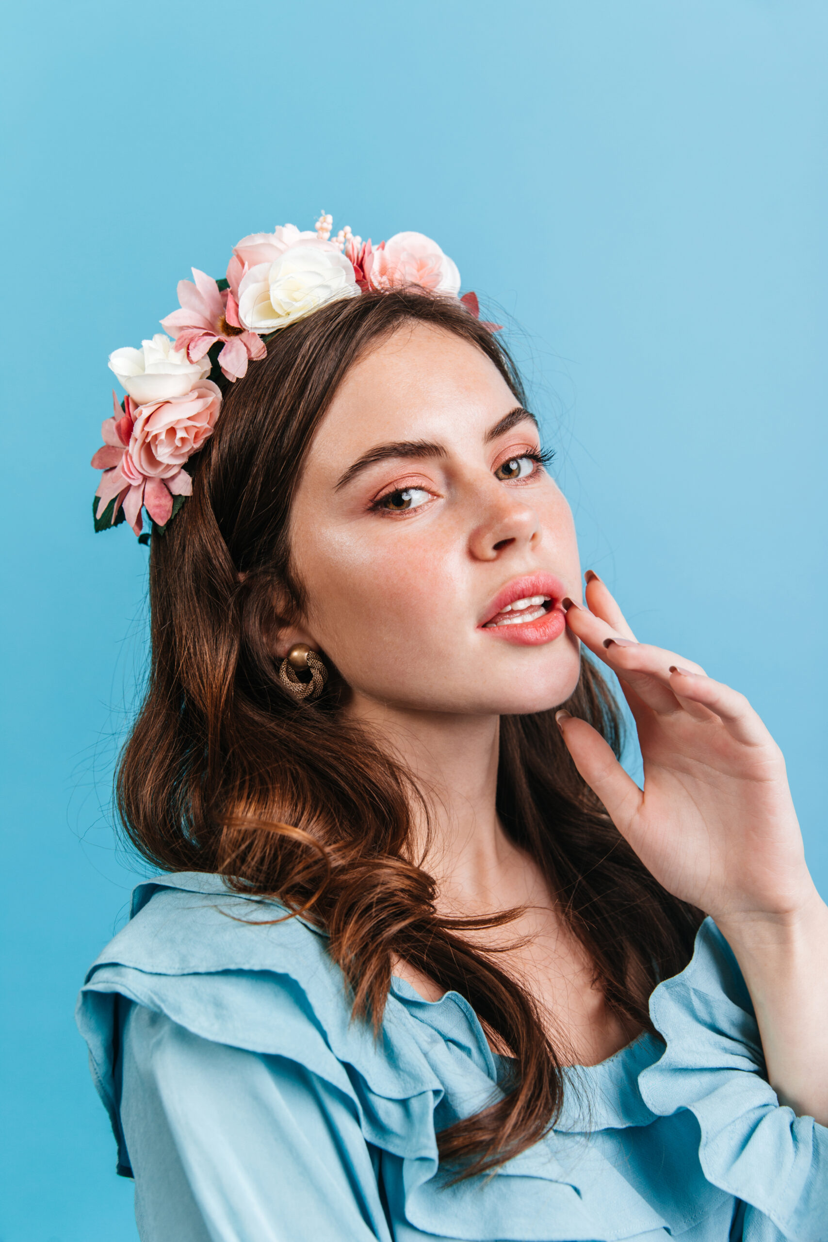 Dark Haired Lady With Plump Lips Green Eyed Girl With Long Eyelashes Crown Flowers Posing Blue Wall Scaled